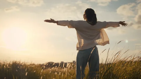 A woman feeling happy and free